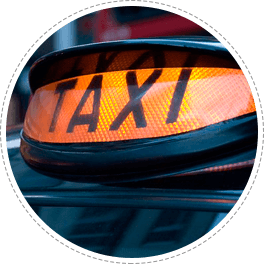 A yellow taxi sign 
